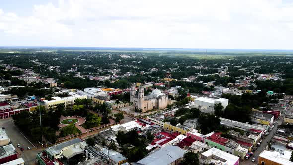 Aerial orbital shot of the entire town of Valladolid in Mexico