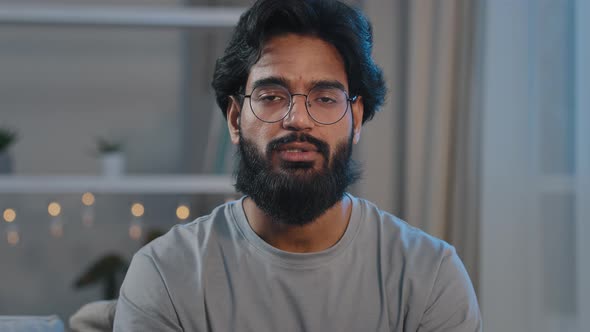 Adult Bearded Indian Arabian Man in Glasses Vlogger Blogger Influencer Talking to Camera Live Video