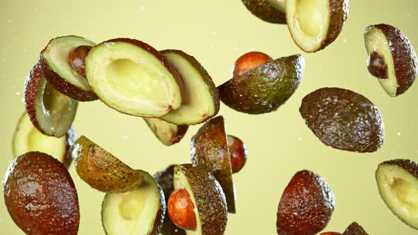 Super Slow Motion Shot of Flying Fresh Avocados at 1000 Fps alt
