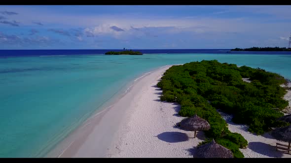 Aerial drone view sky of tropical resort beach voyage by shallow ocean with white sand background of