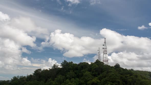 Cloud over antenna of cellular cell phone and communication system tower.