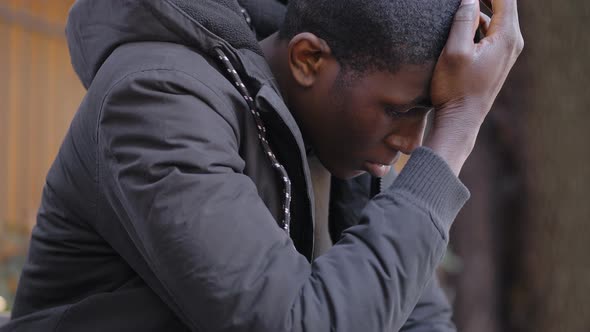 Desperate upset Young american African Man job Loss,depression
