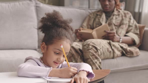 Little Girl Doing Homework alt