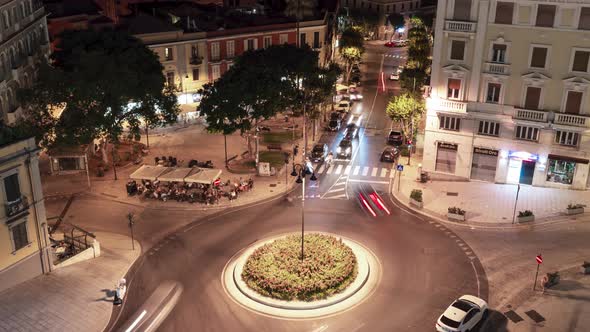 Time lapse at nigth in a small italian city with people