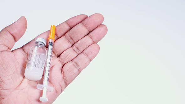 Hand Holds Insulin Injection Medicine 