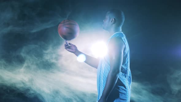 African Athlete is Spinning a Basketball on His Finger