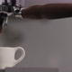 Slow Motion Man Making Espresso with Single Spout Portafilter on Coffee Machine - VideoHive Item for Sale