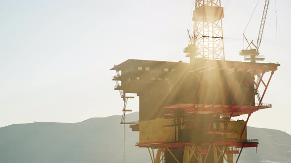 An Offshore Oil Platform at Sunset Light