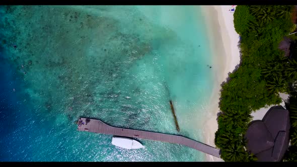 Aerial drone tourism of exotic sea view beach lifestyle by shallow sea with bright sandy background 