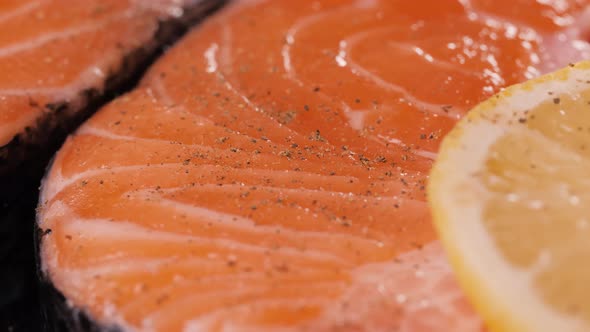 Fresh Red Salmon Texture. Closeup, Close Up Macro Fish Steak with Lemon and Spices