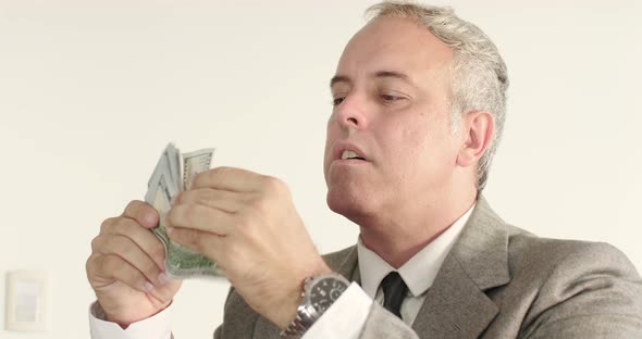 A Businessman Reciving and  Counting Money Cash American Dollars 4K