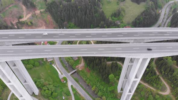 Aerial View of the Highway Viaduct on Concrete Pillars in the Mountains