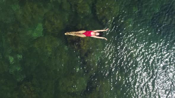 Woman Floating Sea