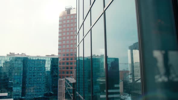 View on Cityscape From Skyscraper Building From Glass with Panoramic Windows