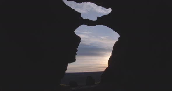 Dark Cave Entrances With Sunset