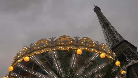 Vintage Carousel and Eiffel Tower in the Evening