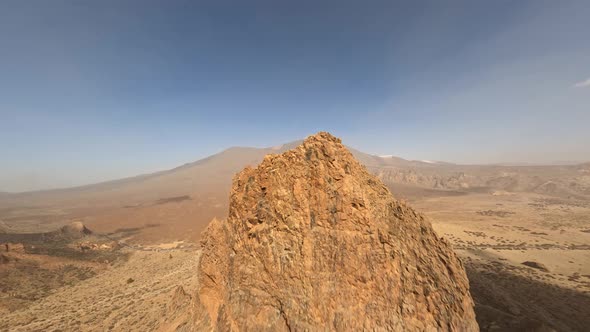 Cliff Rock and Mountain Surfing with a FPV Drone in a Desert and Moon Like Sandy and Rocky Landscape