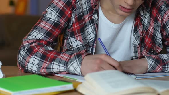 Angry Male Student Throwing Notebooks From Table, Examination Stress, Impatience