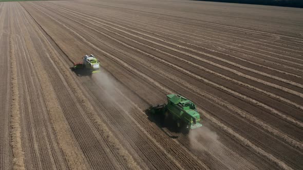 Aerial view of combine harvesting wheat