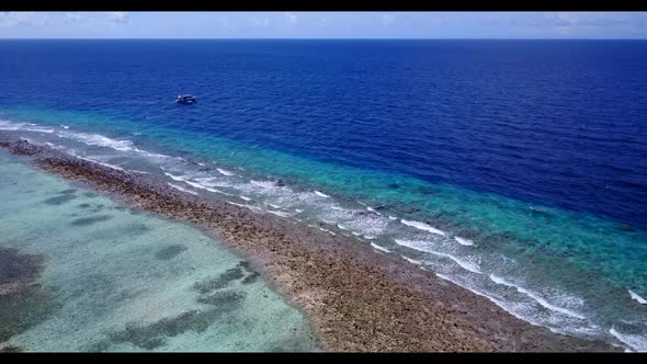 Aerial drone view sky of exotic coast beach trip by blue green sea with bright sandy background of a