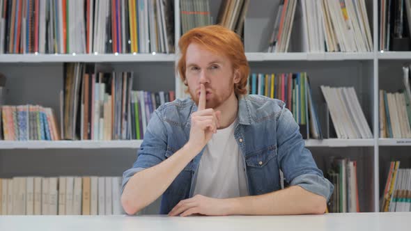 Silent, Silence Gesture by Man with Red Hairs