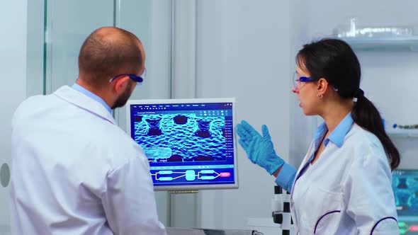 Scientists Coworkers Working in Chemical Lab