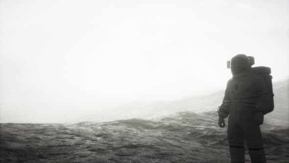 Astronaut on Another Planet with Dust and Fog