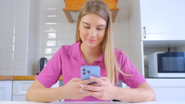 Beautiful young white woman using modern smartphone for communication online in 4k footage