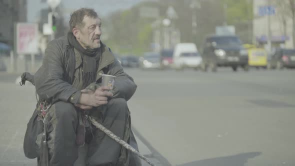 Beggar Homeless Man Tramp. Poverty. Vagrancy. Kyiv. Ukraine.