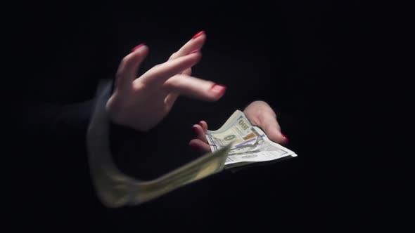 Women's Hands Making Rich Money Bill Tossing Gesture