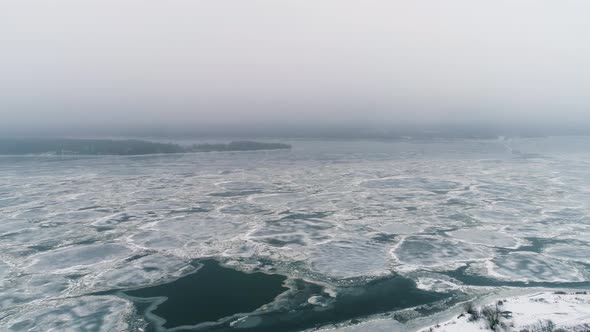 Spring Ice Drift on the River on a Cloudy Day - Drone Collection