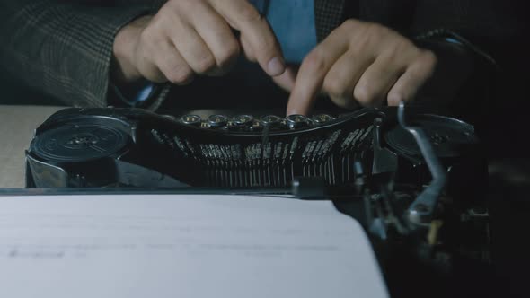 Script Writer Prints the Text on a Typewriter