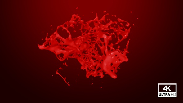 Drops of Red Paint Collide and Create a Splash