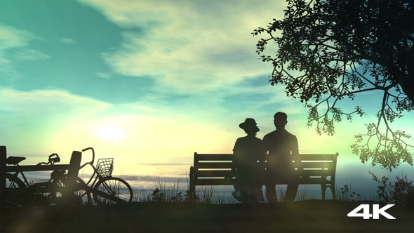 Couple On A Bench Watching The Ocean 4K