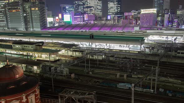 Timelapse Tokyo Railway Station with Purple Illuminated Roof