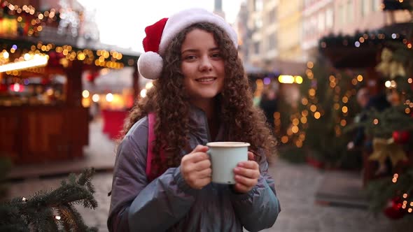 Young girl on Christmas market in Wroclaw, Poland