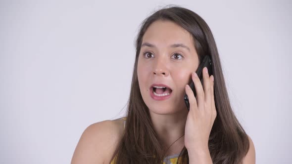 Young Happy Multi-ethnic Tourist Woman Talking on the Phone