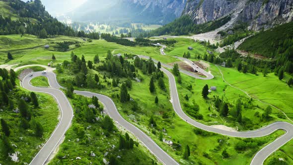 Awesome winding road at Passo Gardena, Dolomites, aerial view