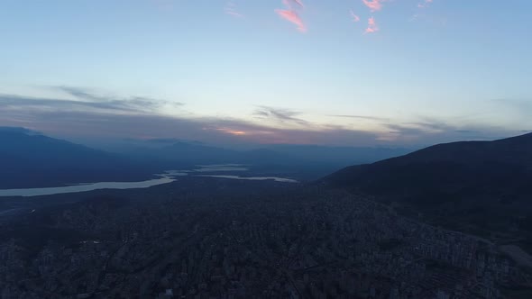 City River And Mountain Aerial Sunset Clouds 