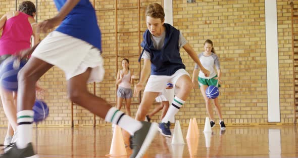 Group of high school kids playing basketball