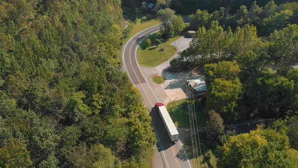 Semi Truck Driving On Curvy Country Road