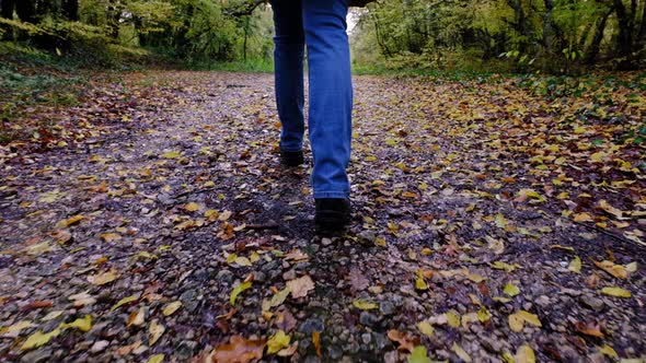 Close Up of Woman Legs Hiking Steep Terrain in Slow Motion