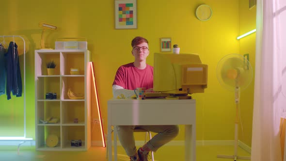 Portrait of Young Man Student In Home Office