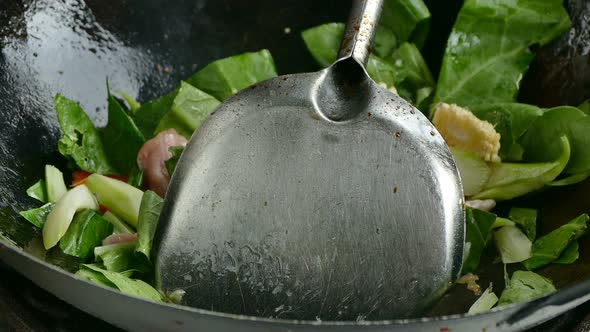 4K footage, chef cooking Stir-fried Mixed Vegetables Thai Street Food 