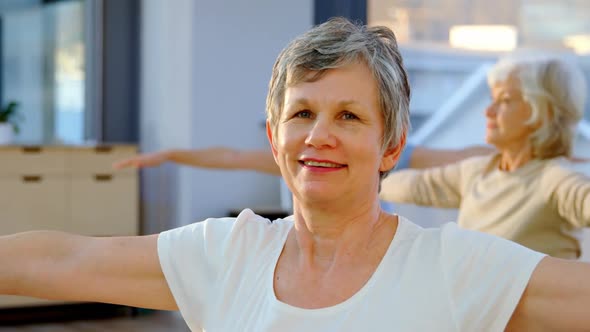 Senior women performing yoga 4k