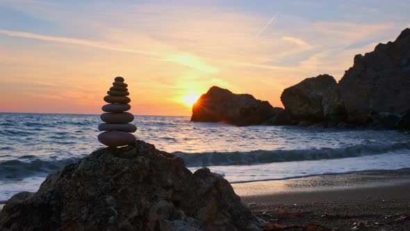 Concept of Balance and Harmony - Stone Stacks on the Beach