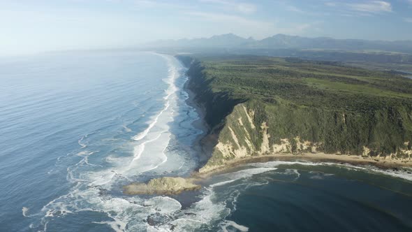 Aerial View of Gericke's point with waves and beach, Western Cape, South Africa.