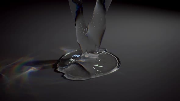 A Jet Of Water With Spectral Light Pours Onto The Surface And Spreads