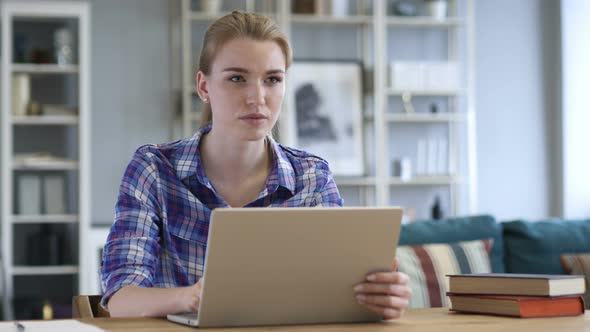 Young Woman Working On Laptop