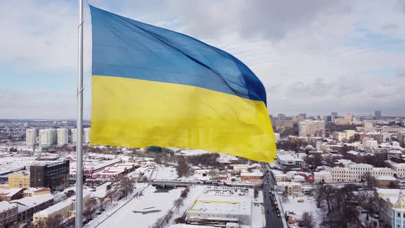 Ukrainian flag in the wind. Blue Yellow flag in the city of Kharkov